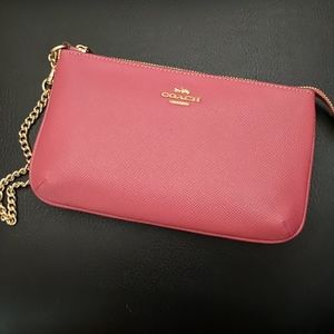 COACH pink wristlet with gold hardware